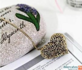 Оригинальные витые кулоны сердечки