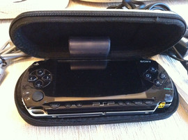 PSP fat + камера + чехол + 2 игры